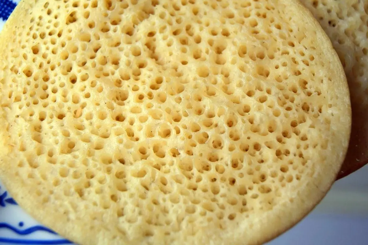 Golden Moroccan Baghrir semolina crepes with honey butter