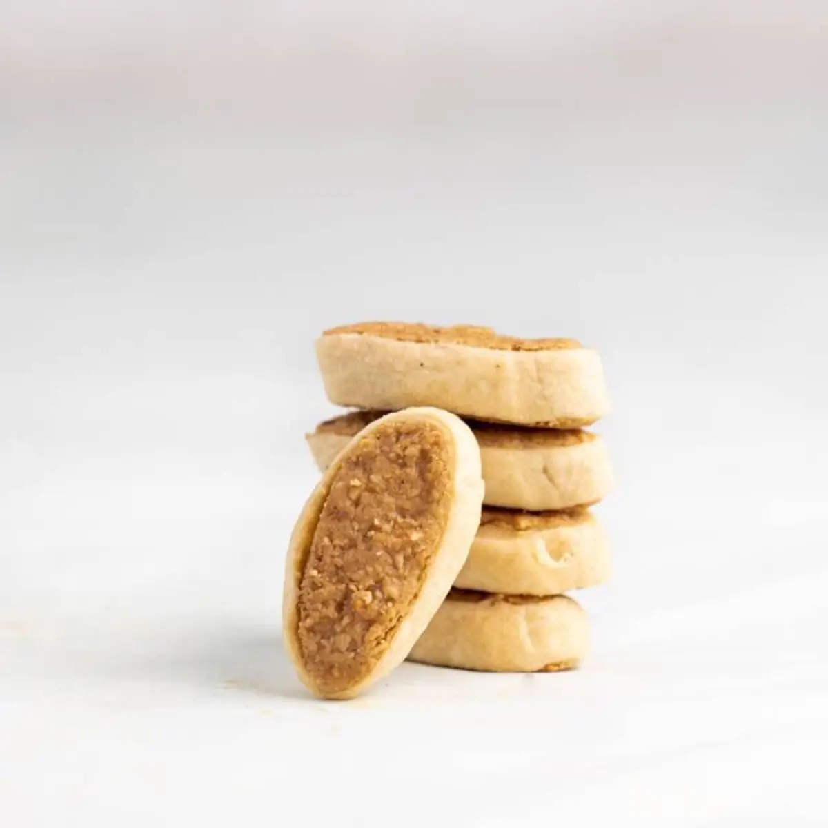 Crisp golden Moroccan Fekkas almond biscotti arranged neatly on a plate
