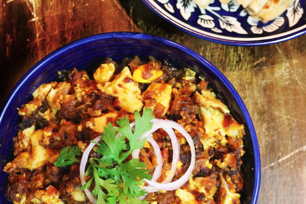 A bowl of Moroccan zaalouk eggplant salad with bread